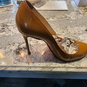 Christian Louboutin Red Bottoms.